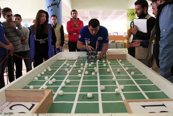 Students participate in the 11th National Robotics Competition at the Jubilee Centre for Excellence in Education in Amman on Sunday (Photo by Osama Aqarbeh)